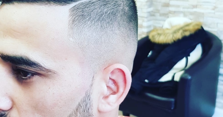 Photo of customer at Selo Barbers Penzance Photo of a customer who has a trimmed beard and a short style haircut by Selo Barbers Penzance